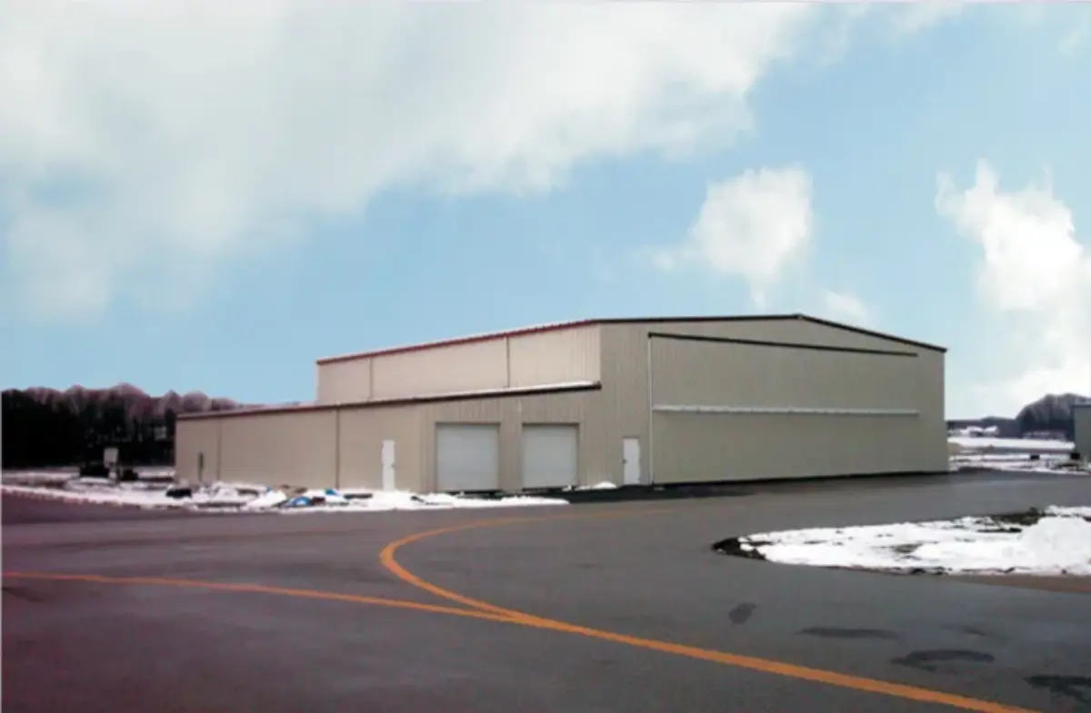 A large building with a lot of windows and doors