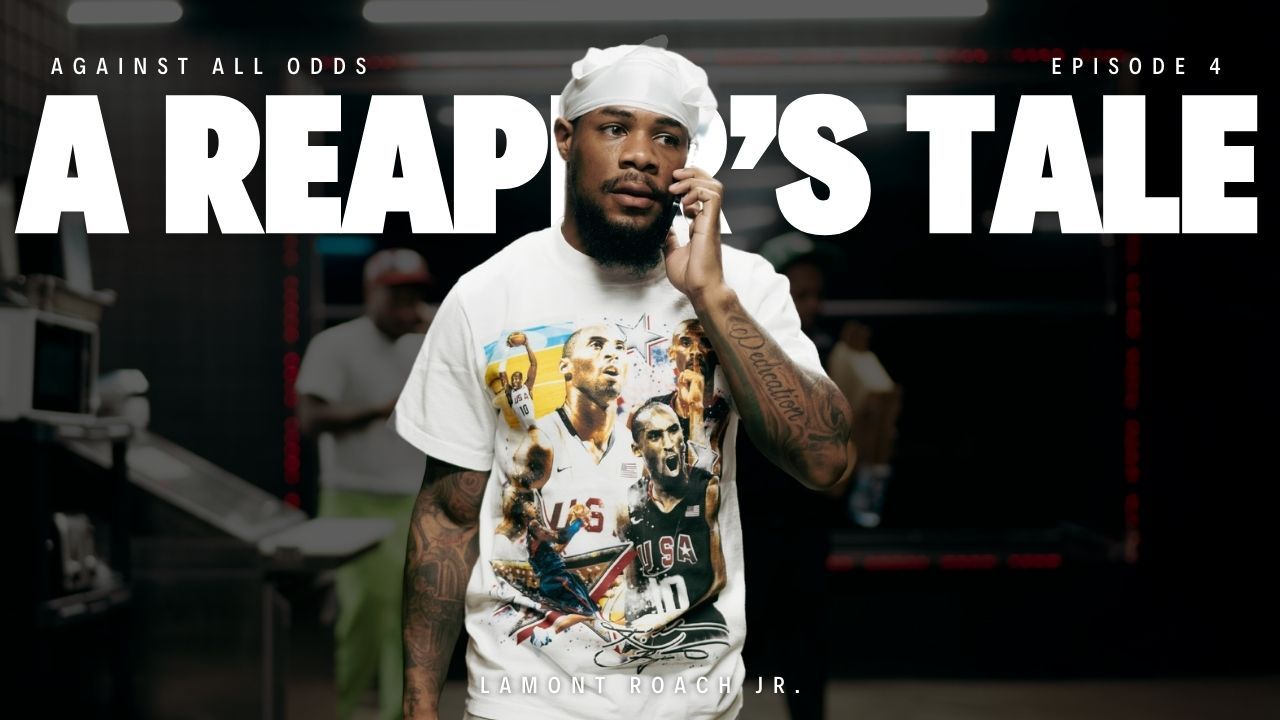 Man on phone wearing graphic tee, hair wrap, in dark room. Text: Against All Odds, A Reaper's Tale.