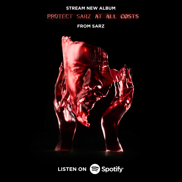 Red, translucent bust held in hands, album art for 