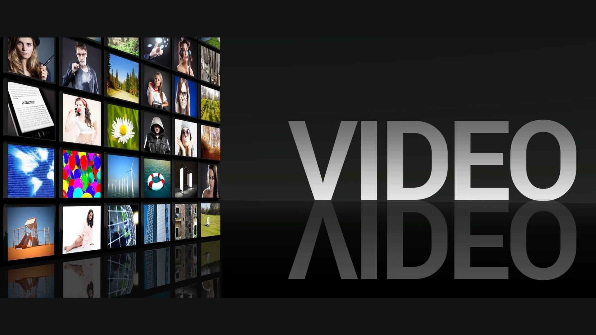 image of large video screen full of images and word Video