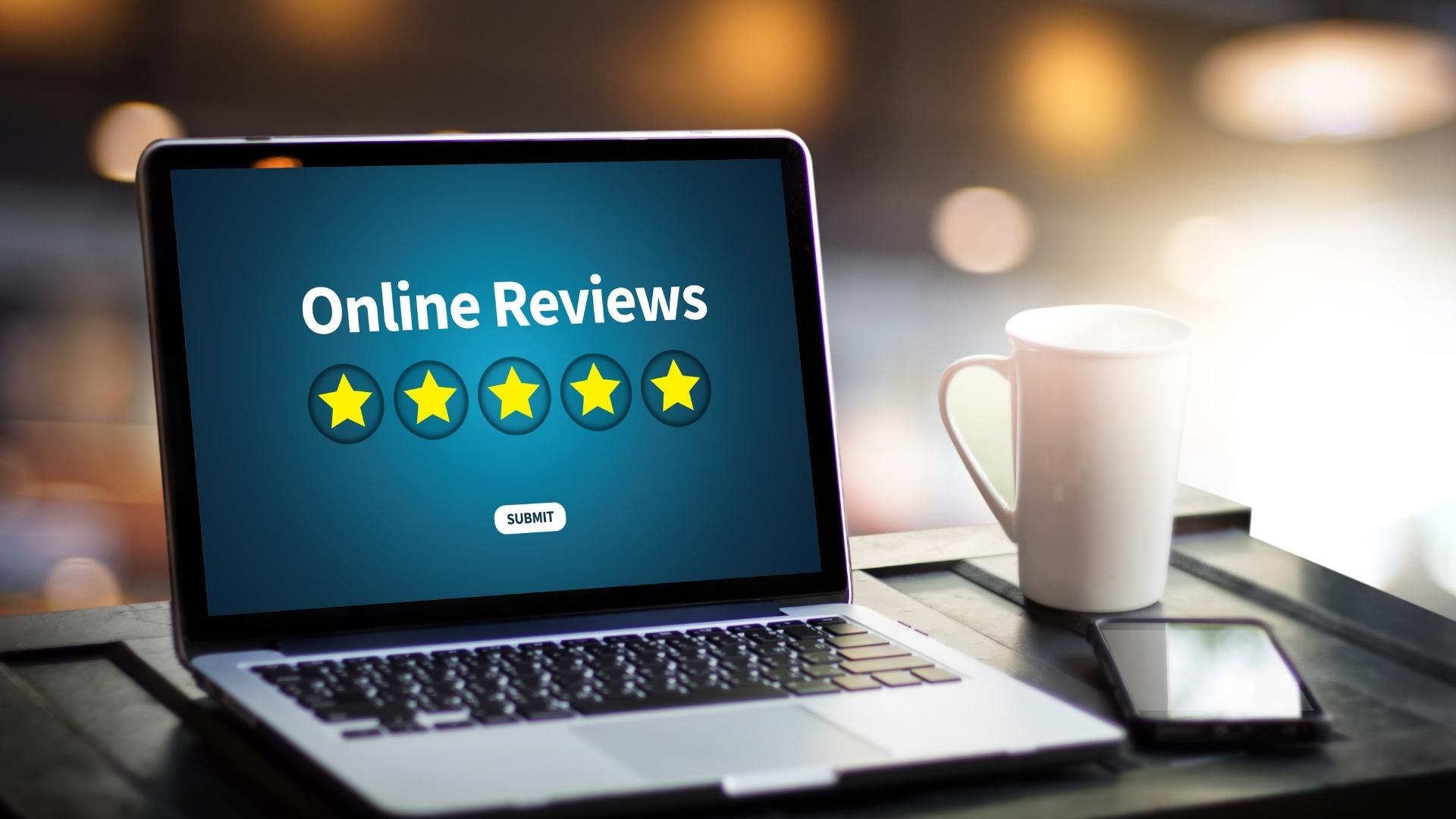 laptop with online review stars and submit form