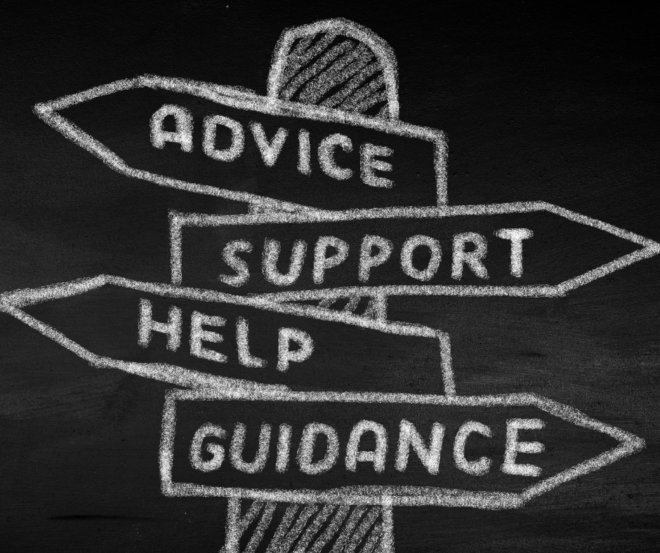 Chalkboard drawing of signpost with four arrows labeled 'Advice', 'Support', 'Help', and 'Guidance'.