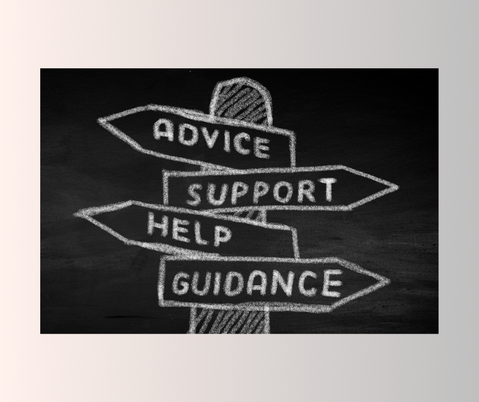 Chalkboard drawing of signpost with four arrows labeled 'Advice', 'Support', 'Help', and 'Guidance'.