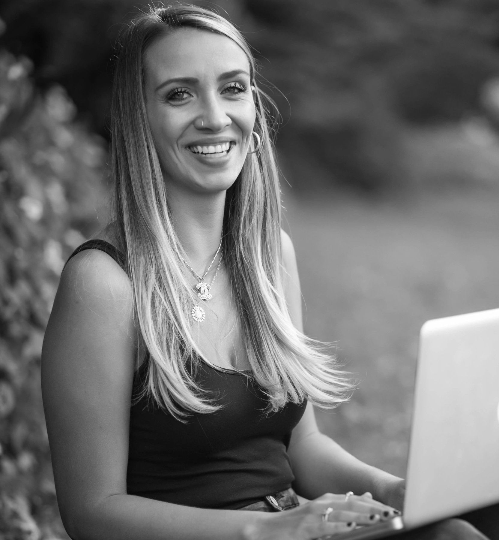 Christina Davis: Young woman with long straight blonde hair, casual outdoor portrait with a bright smile