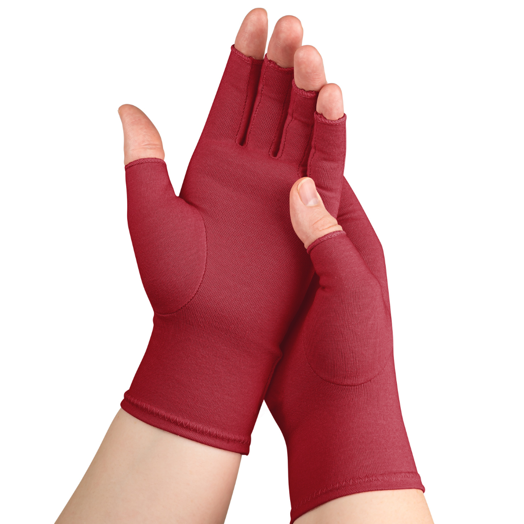 Model wearing A I Arthritis Chili Red compression gloves