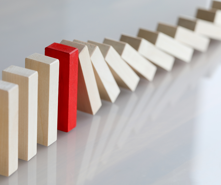 A row of white dominos with one red to signify rare diseases