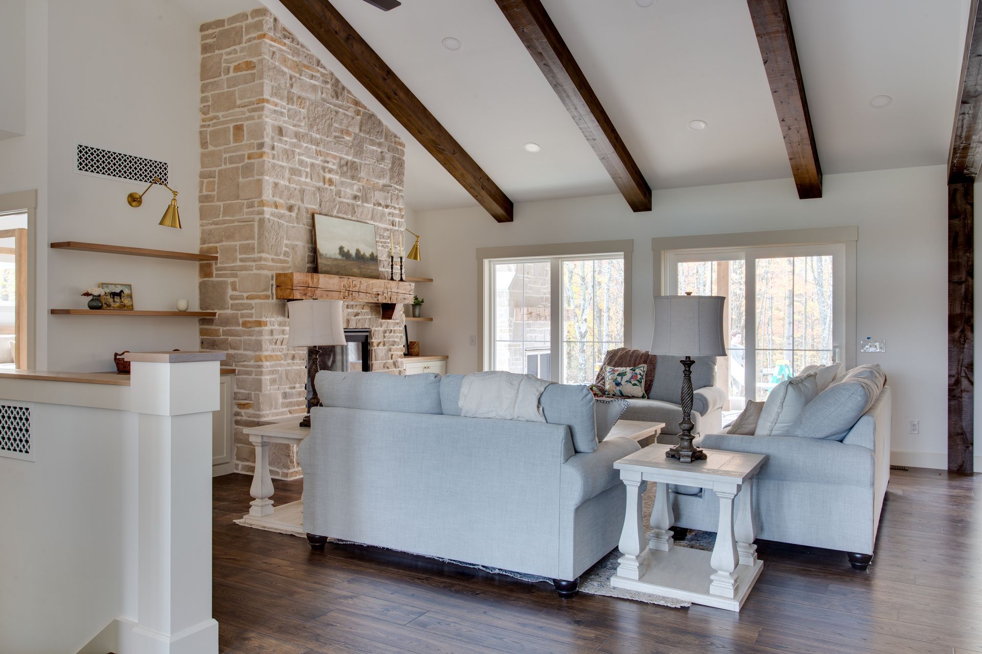 A living room with a couch and a fireplace.