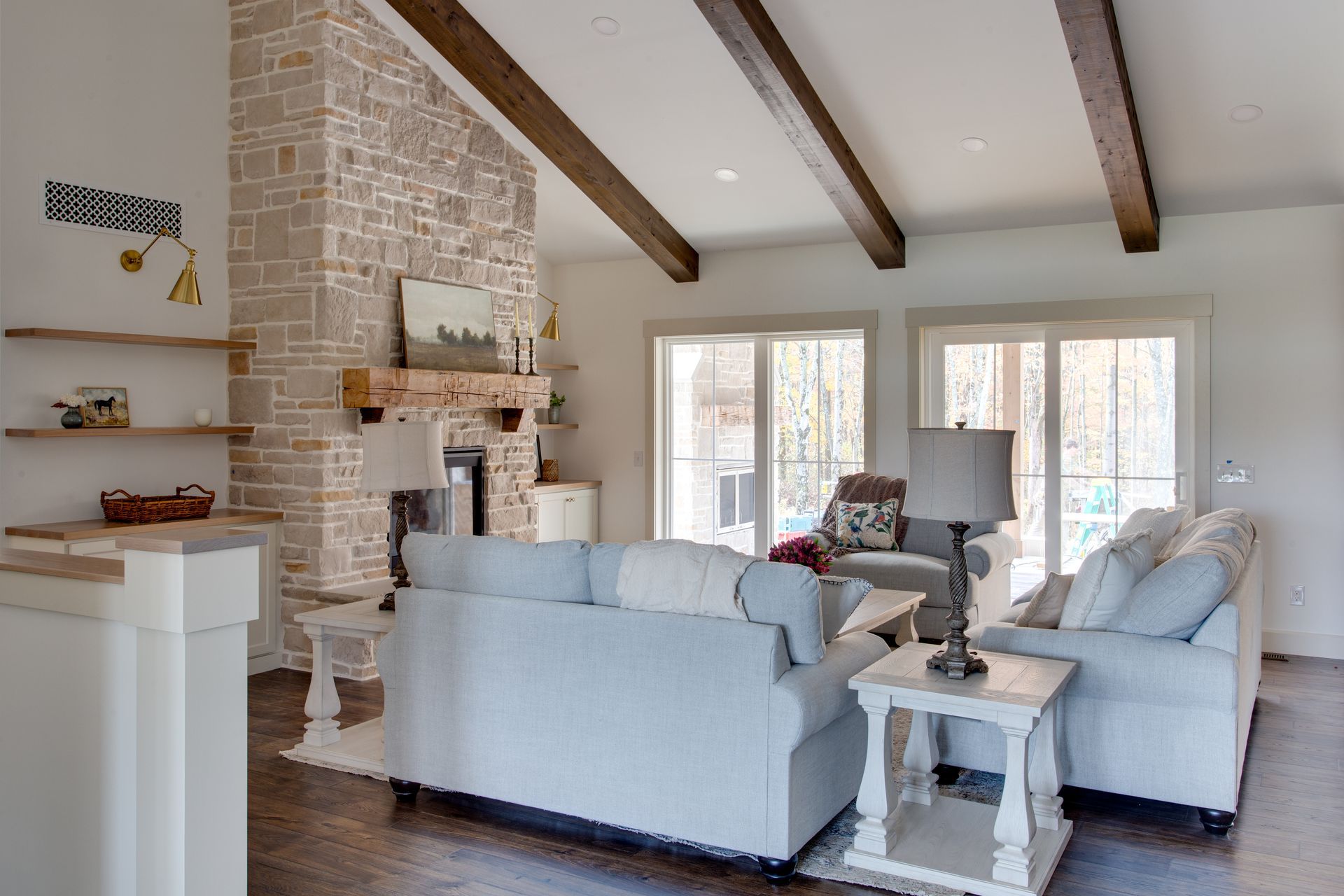 A living room filled with furniture and a fireplace.