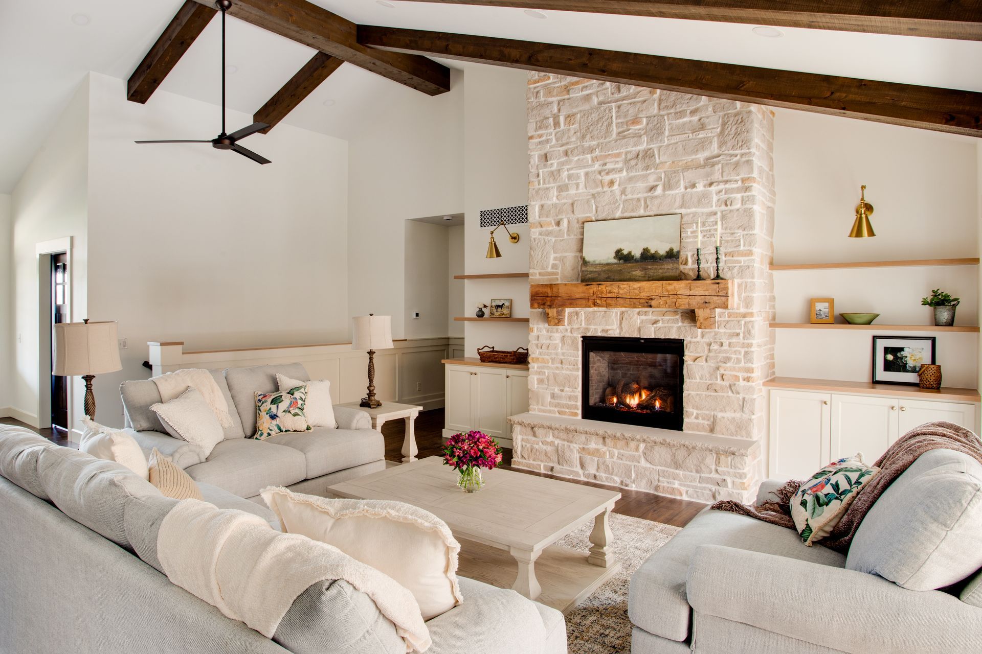A living room with a fireplace and a couch.
