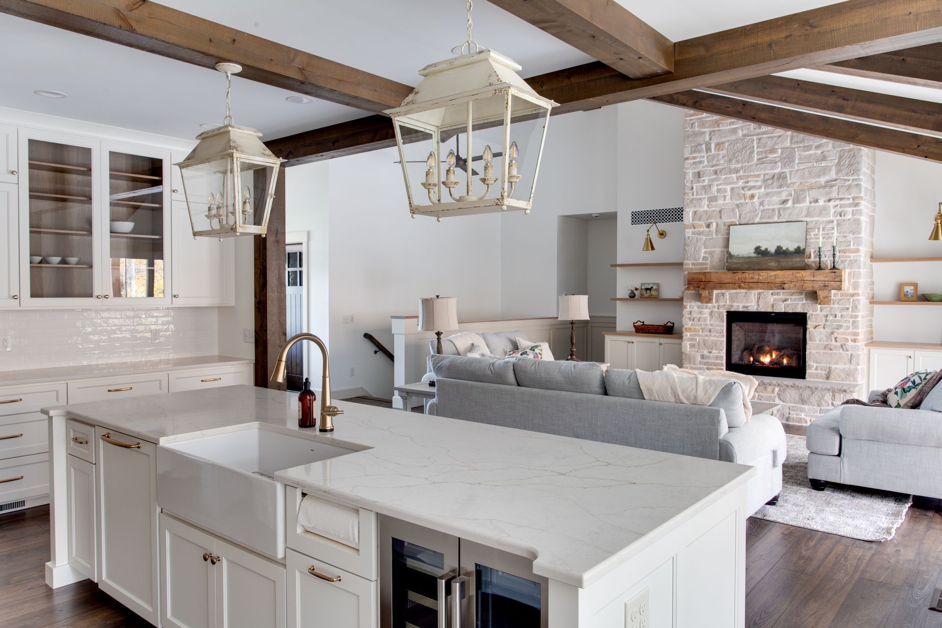 A kitchen with a large island in the middle of the room.