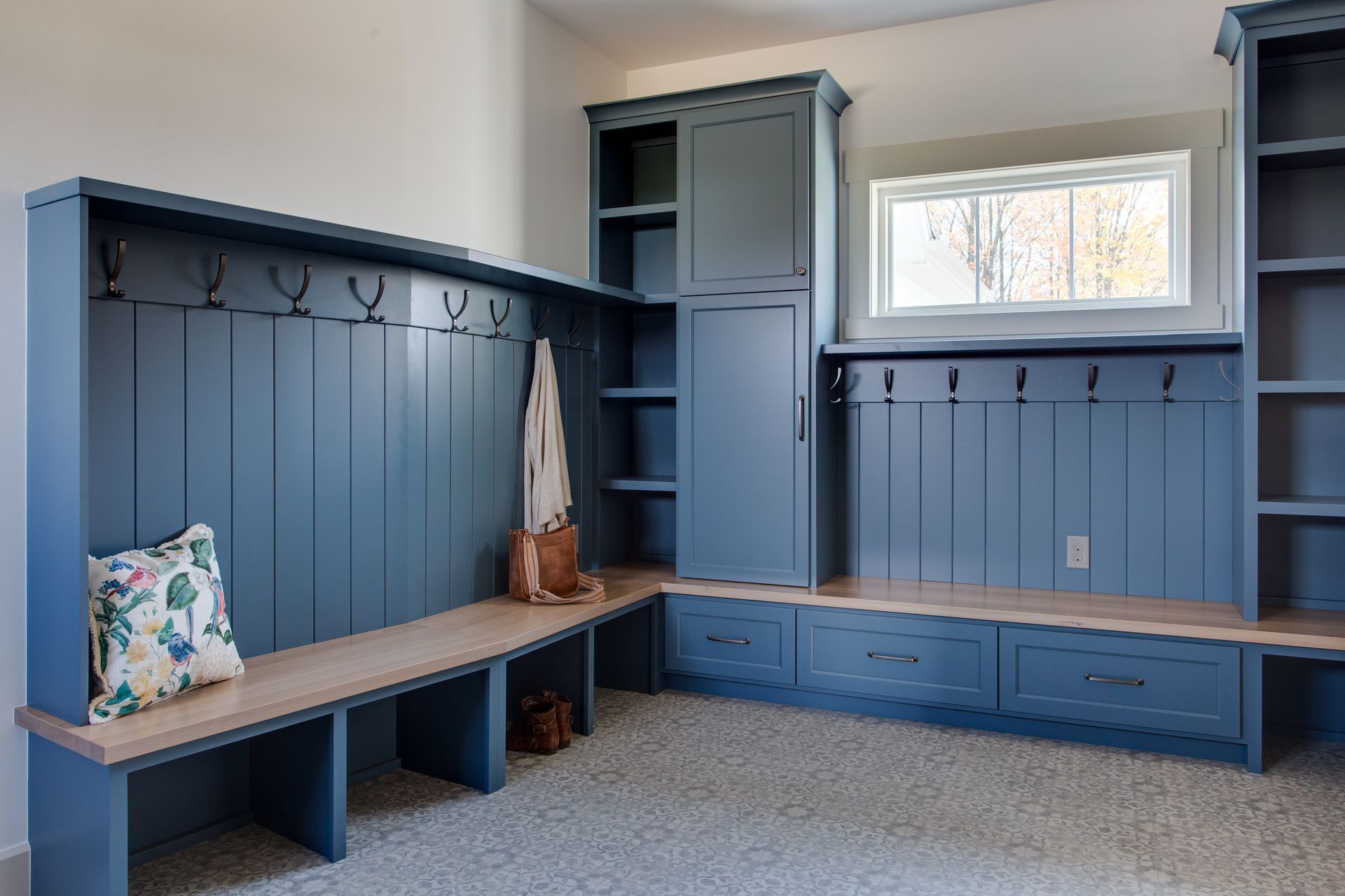 There is a bench in the middle of the room.