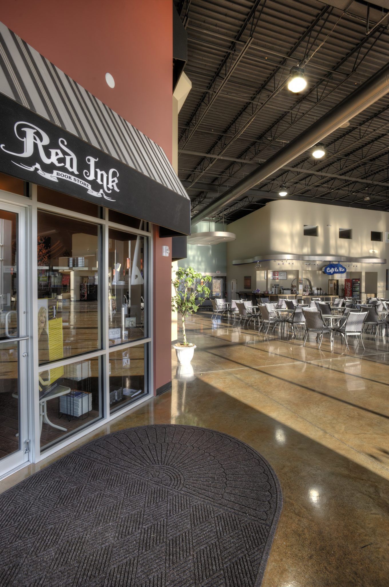 A large building with a sign that says red ink.