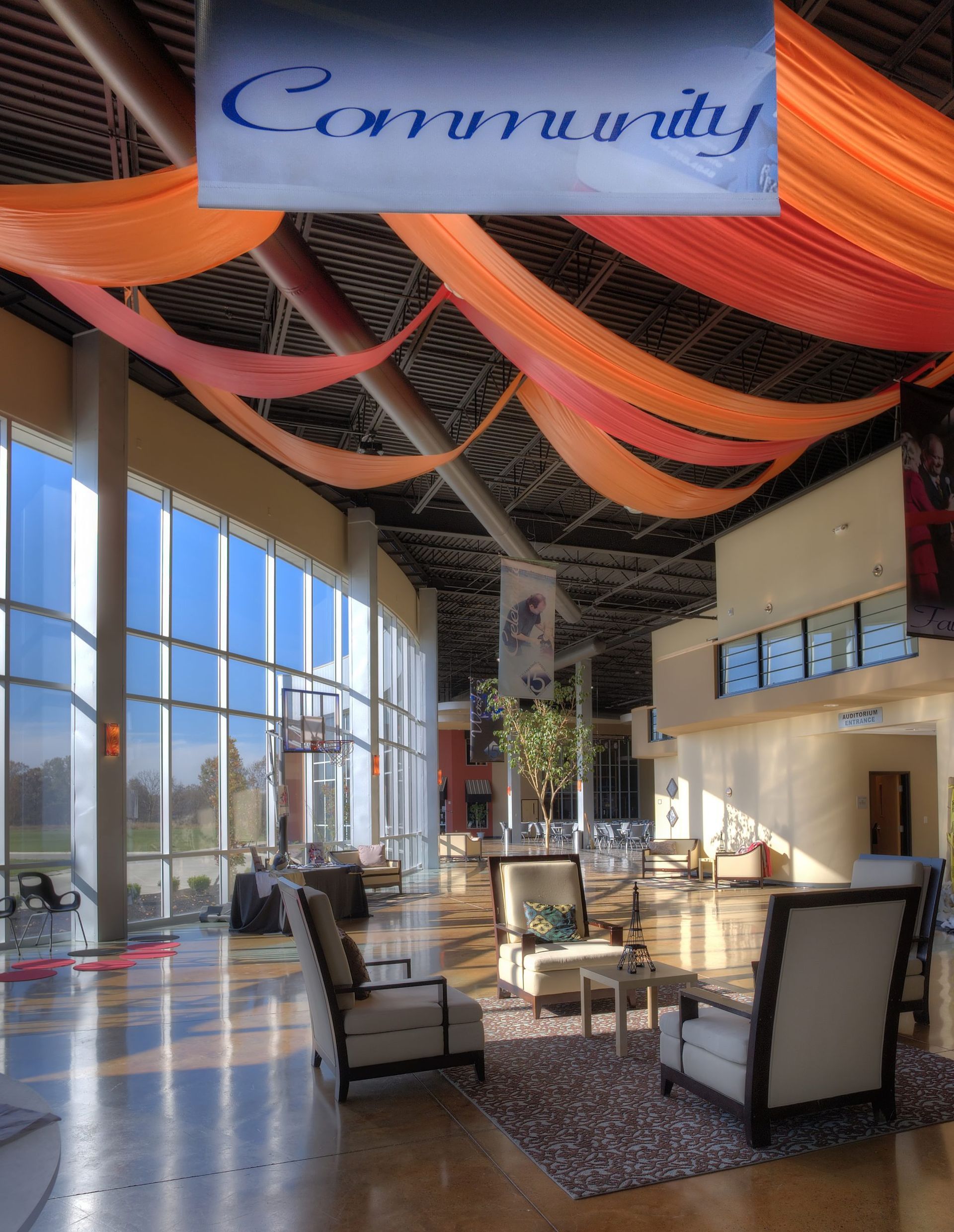 A large room with a sign that says community.