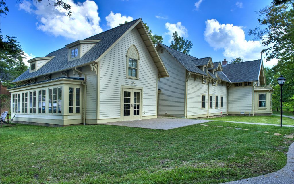 A large house with a lot of windows.