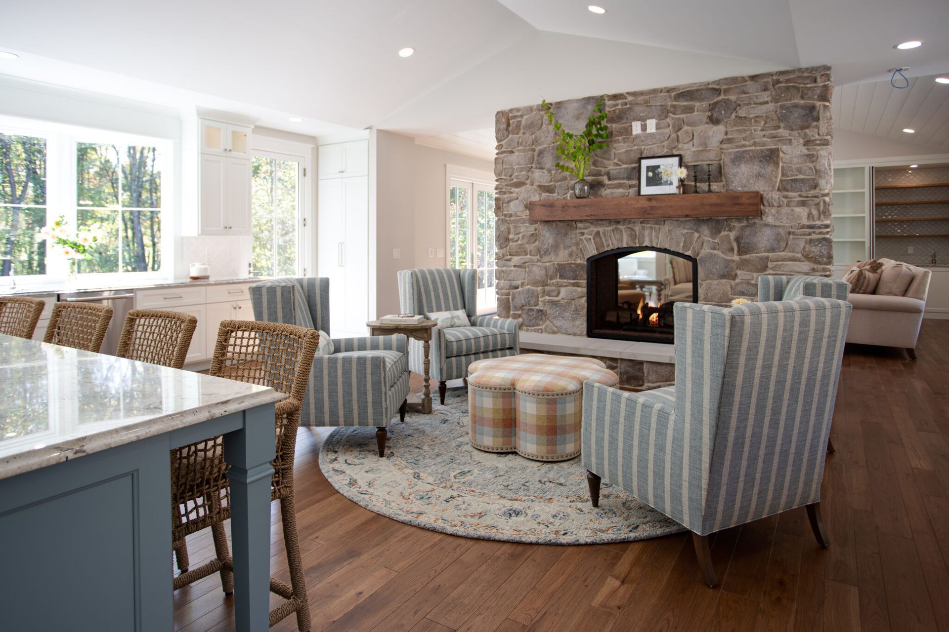 A living room filled with furniture and a fireplace.