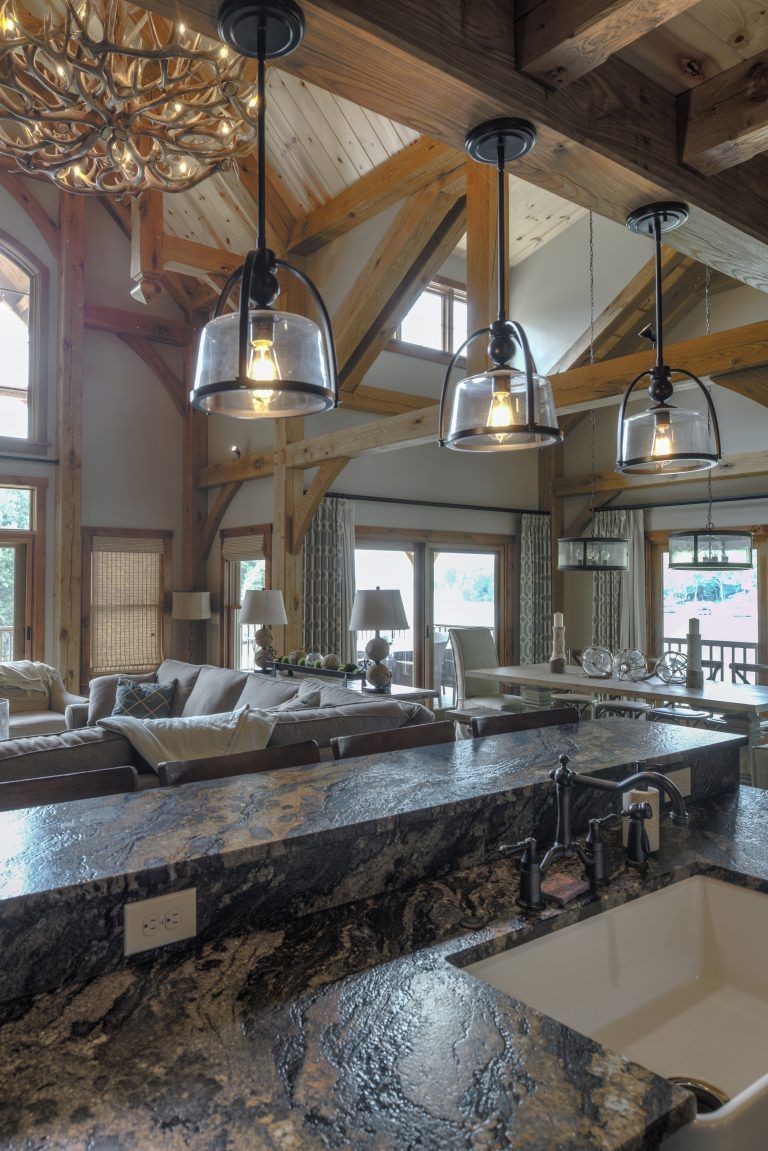 A kitchen with a large counter top and a sink.