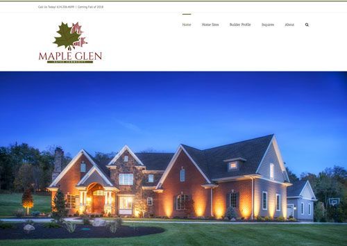 A website for maple glen shows a large brick house lit up at night.
