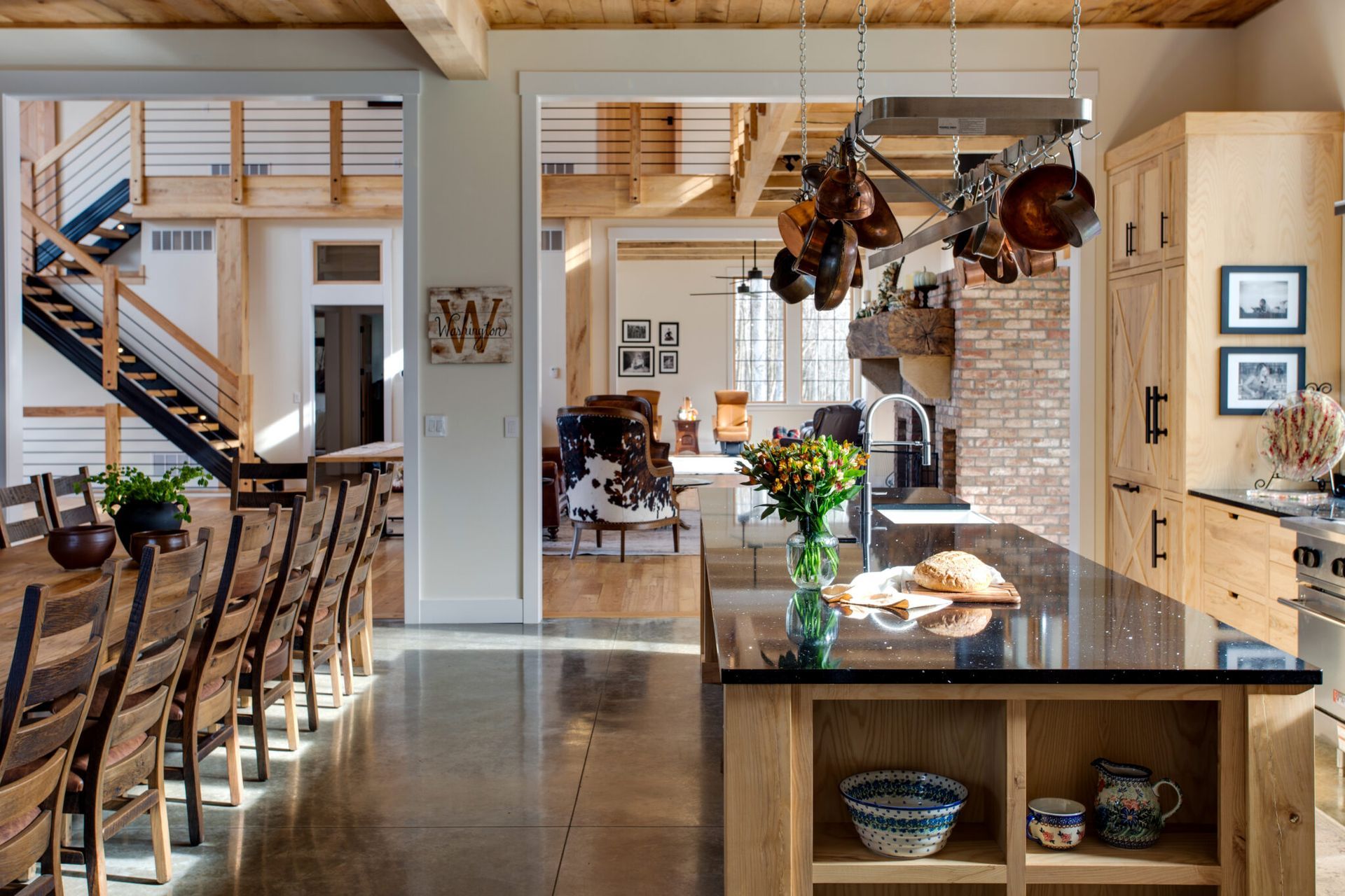 A kitchen with a large island in the middle of it.