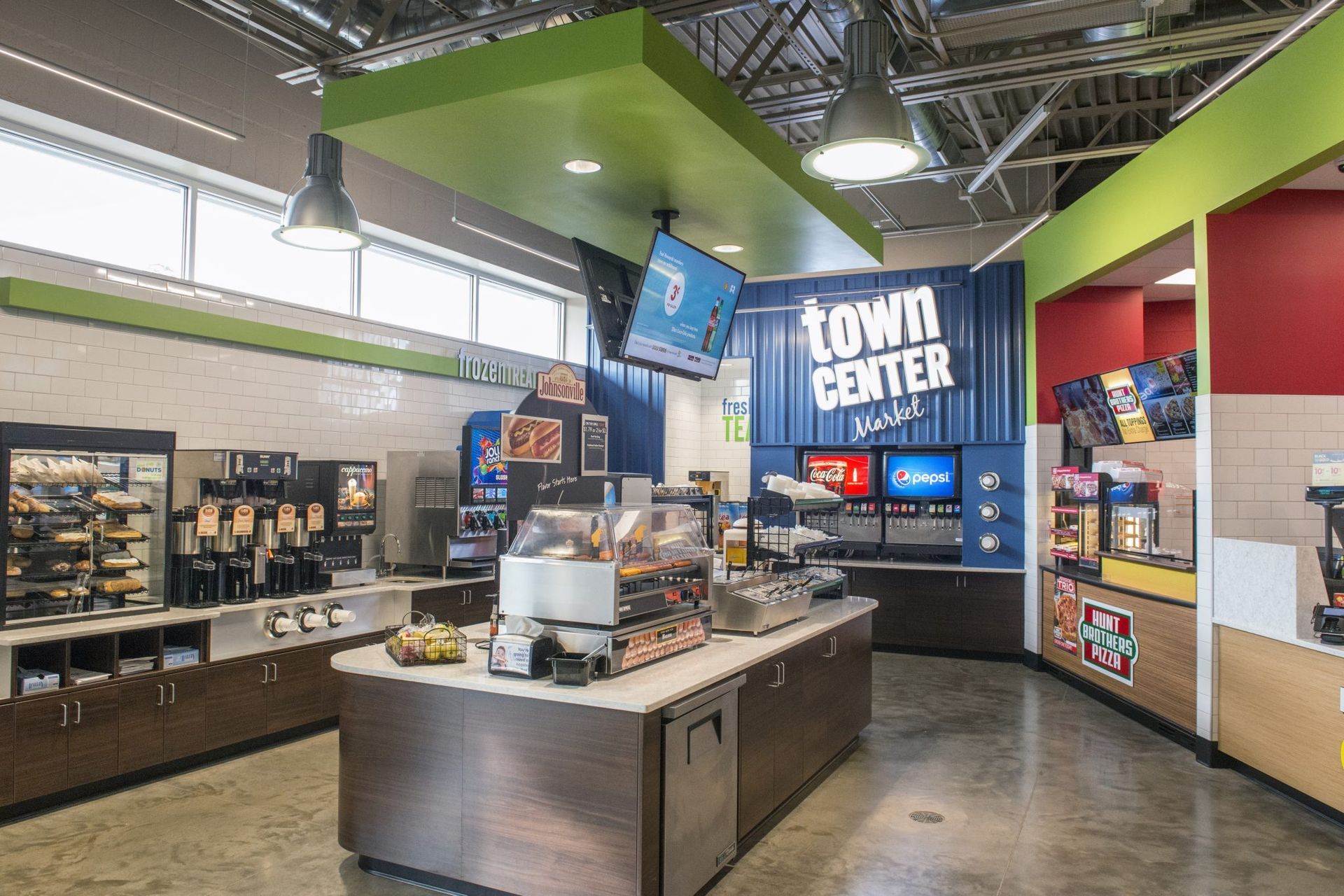 The inside of a restaurant with a sign that says town center.