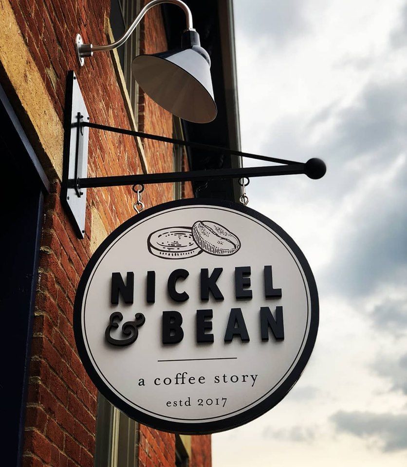 A sign that says nickel & bean on it.