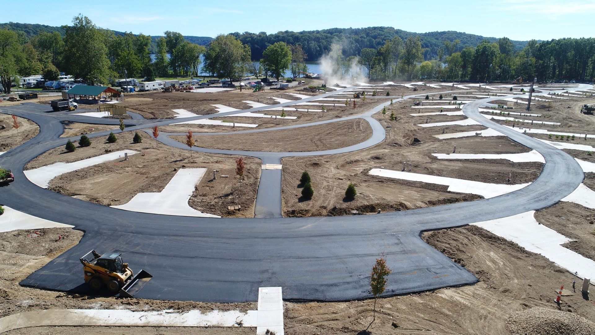 An aerial view of a road that is being built in a campground. 