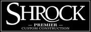 A black and white logo for shrock premier custom construction