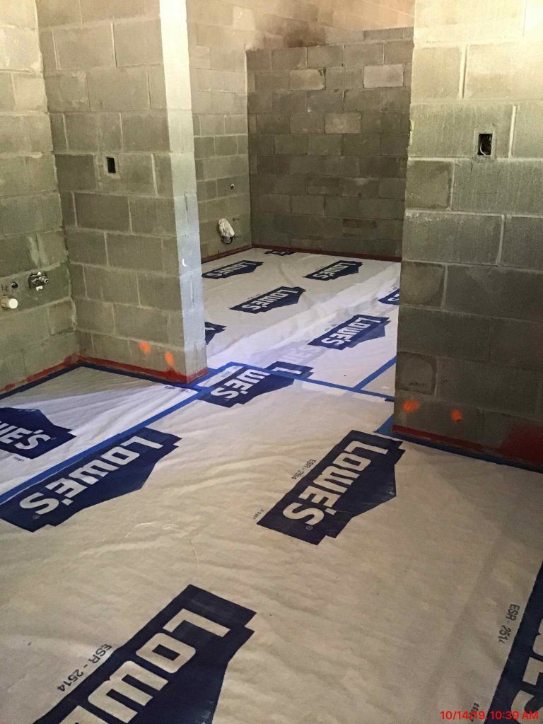 A room with a lot of signs on the floor and walls.