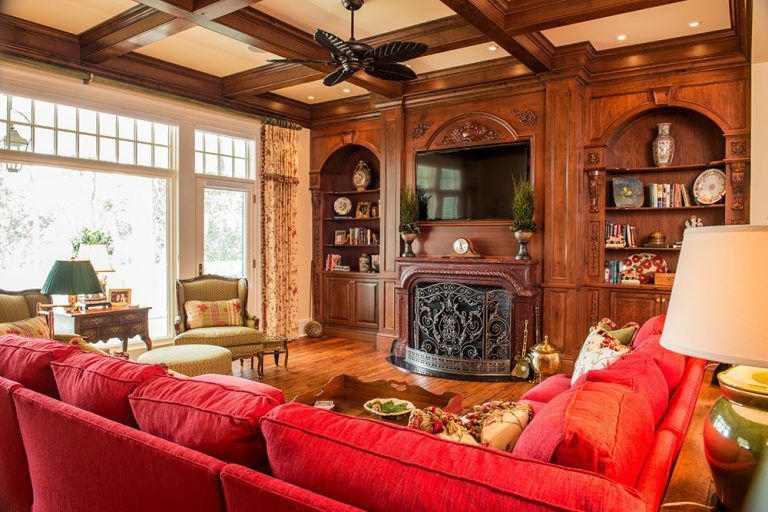 A living room filled with furniture and a fireplace.