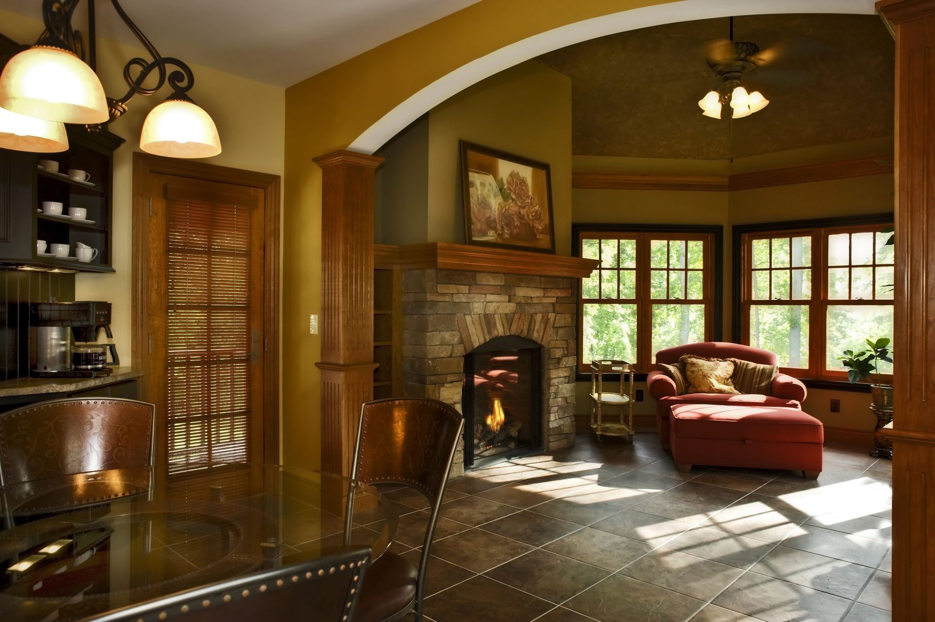 A living room filled with furniture and a fireplace.