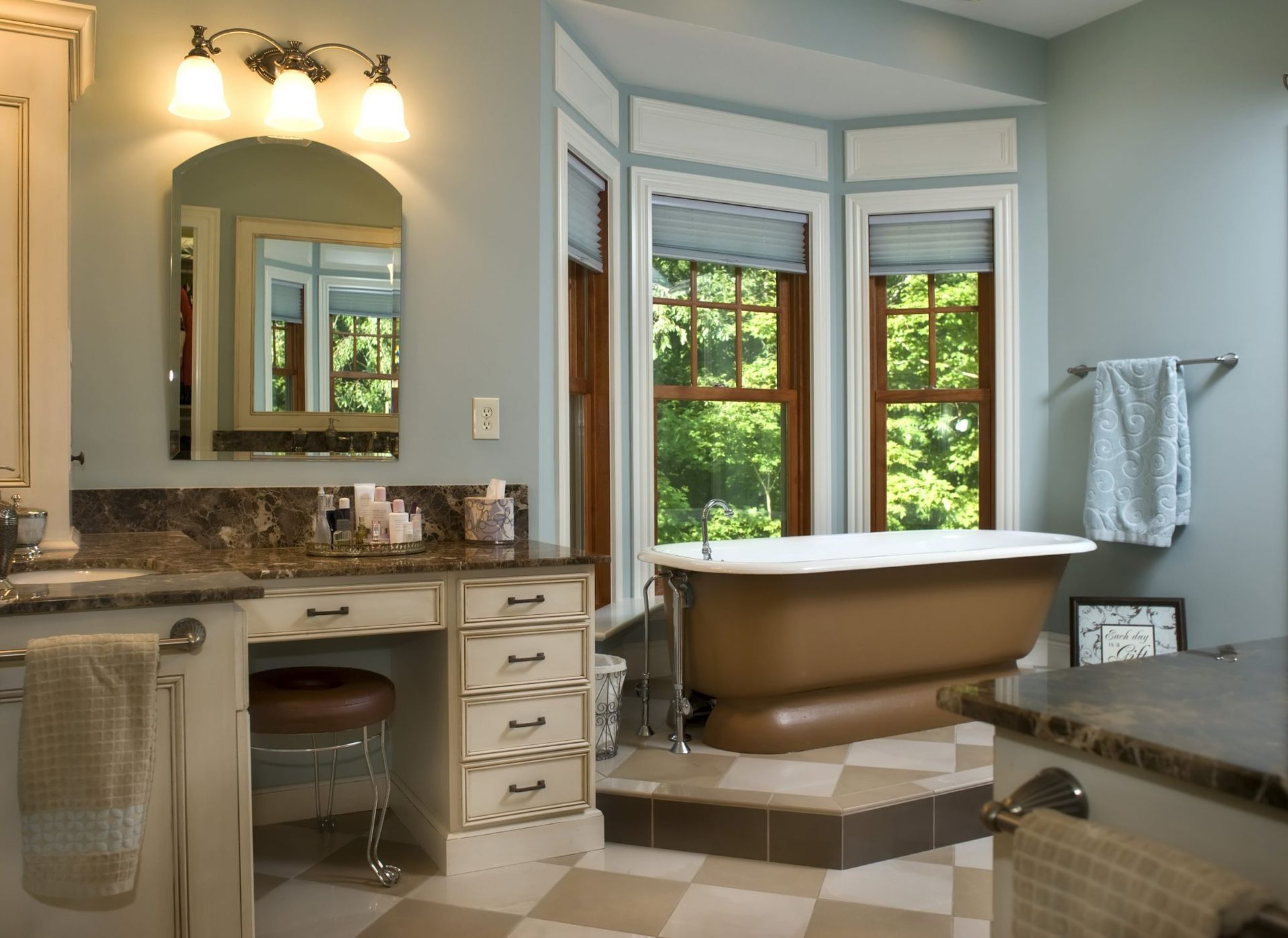 A bathroom with a bathtub and a mirror.