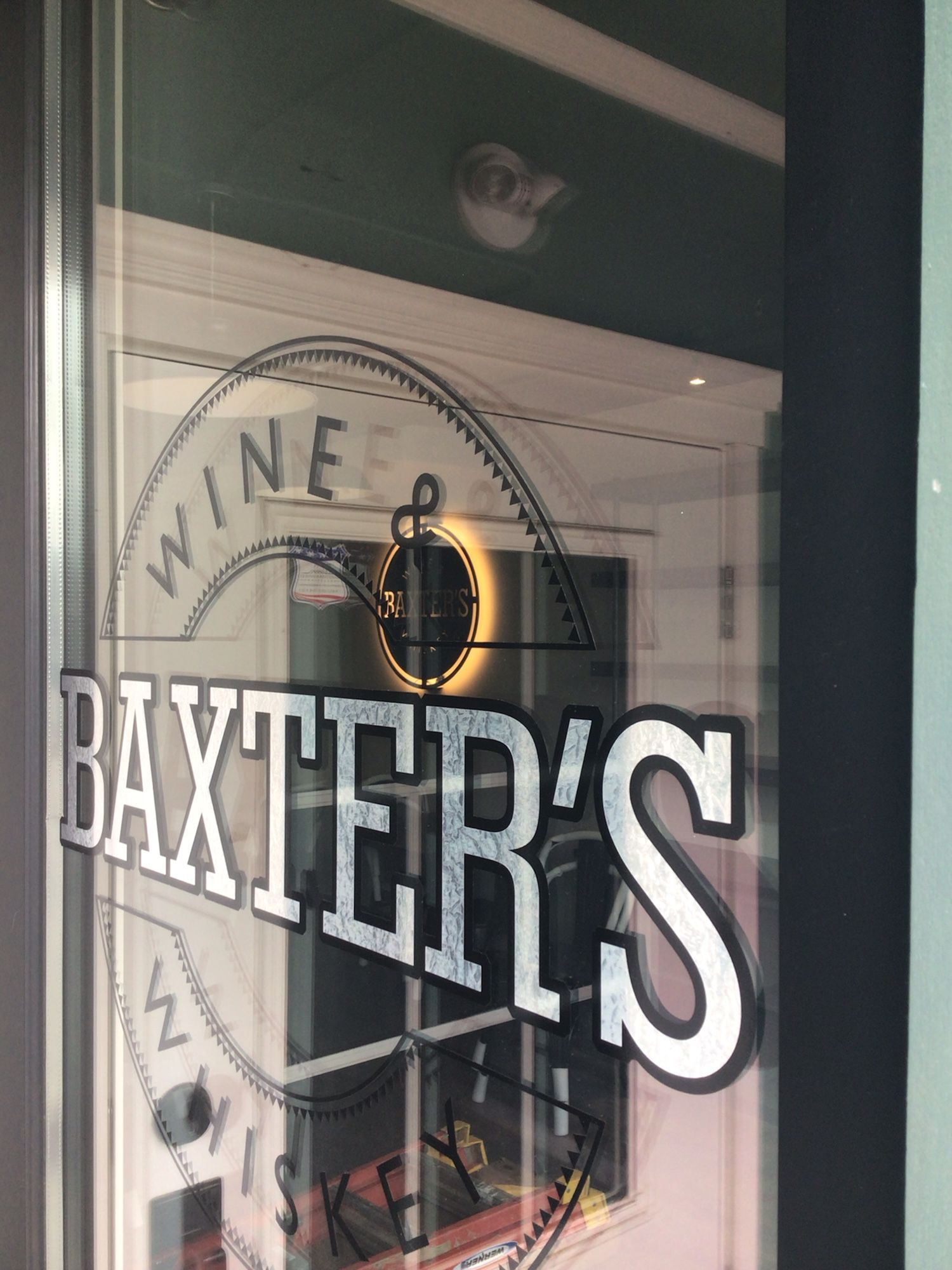 A window with the word baxter 's on it.