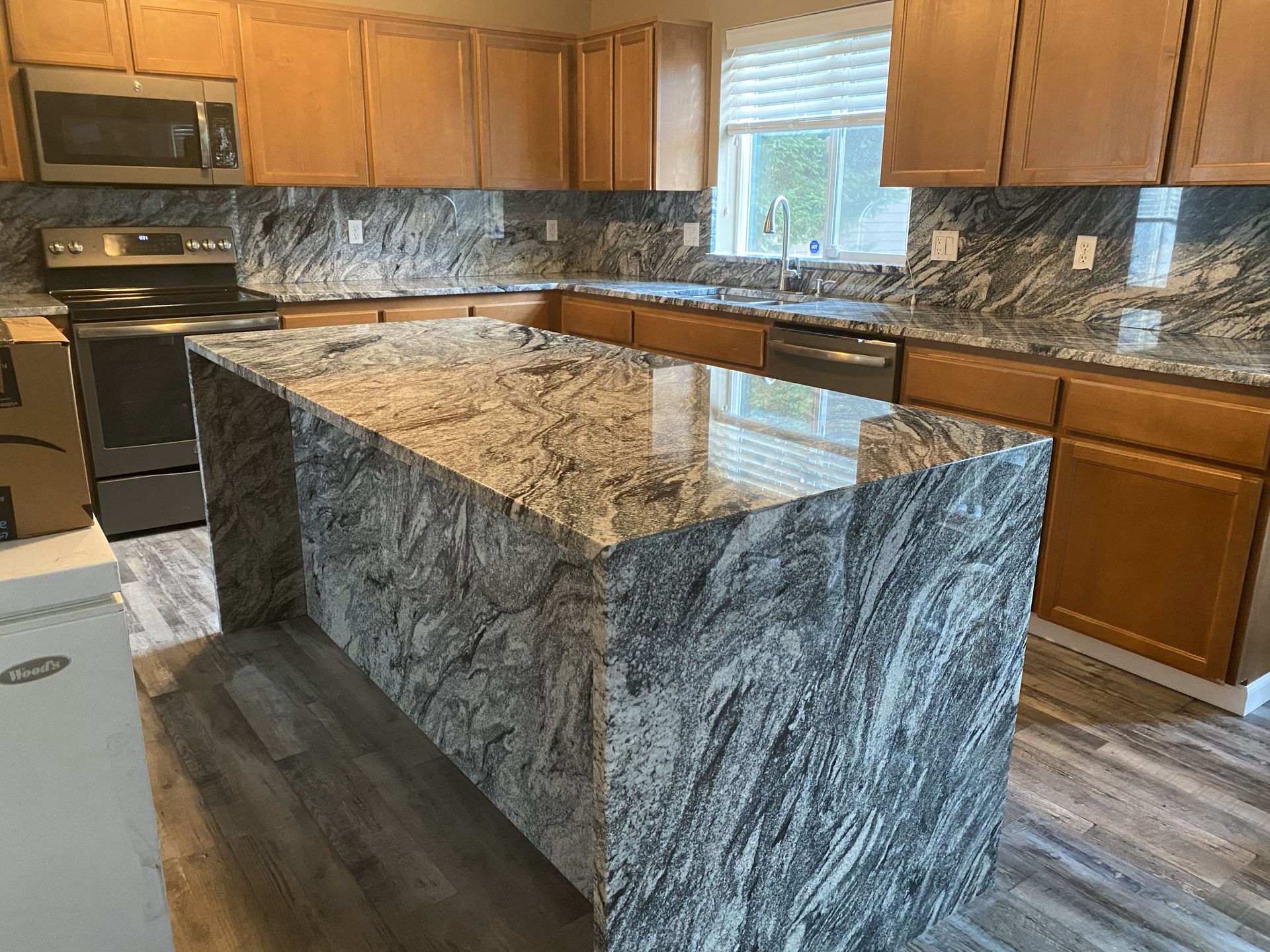kitchen countertops, kitchen island with waterfall edges