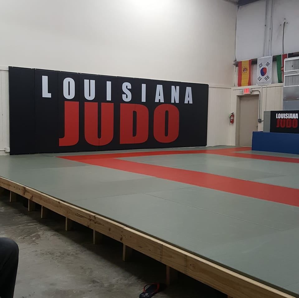 A large sign that says louisiana judo on it