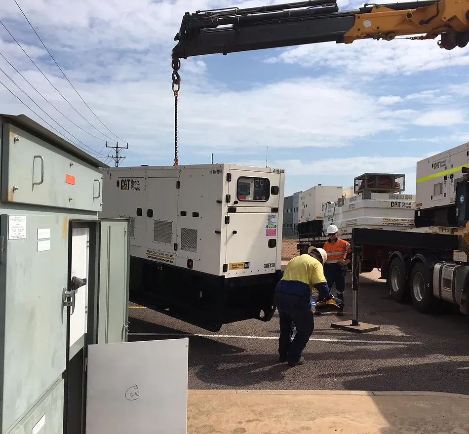 Workers Moving CAT Power System — Refrigeration in Berrimah, NT