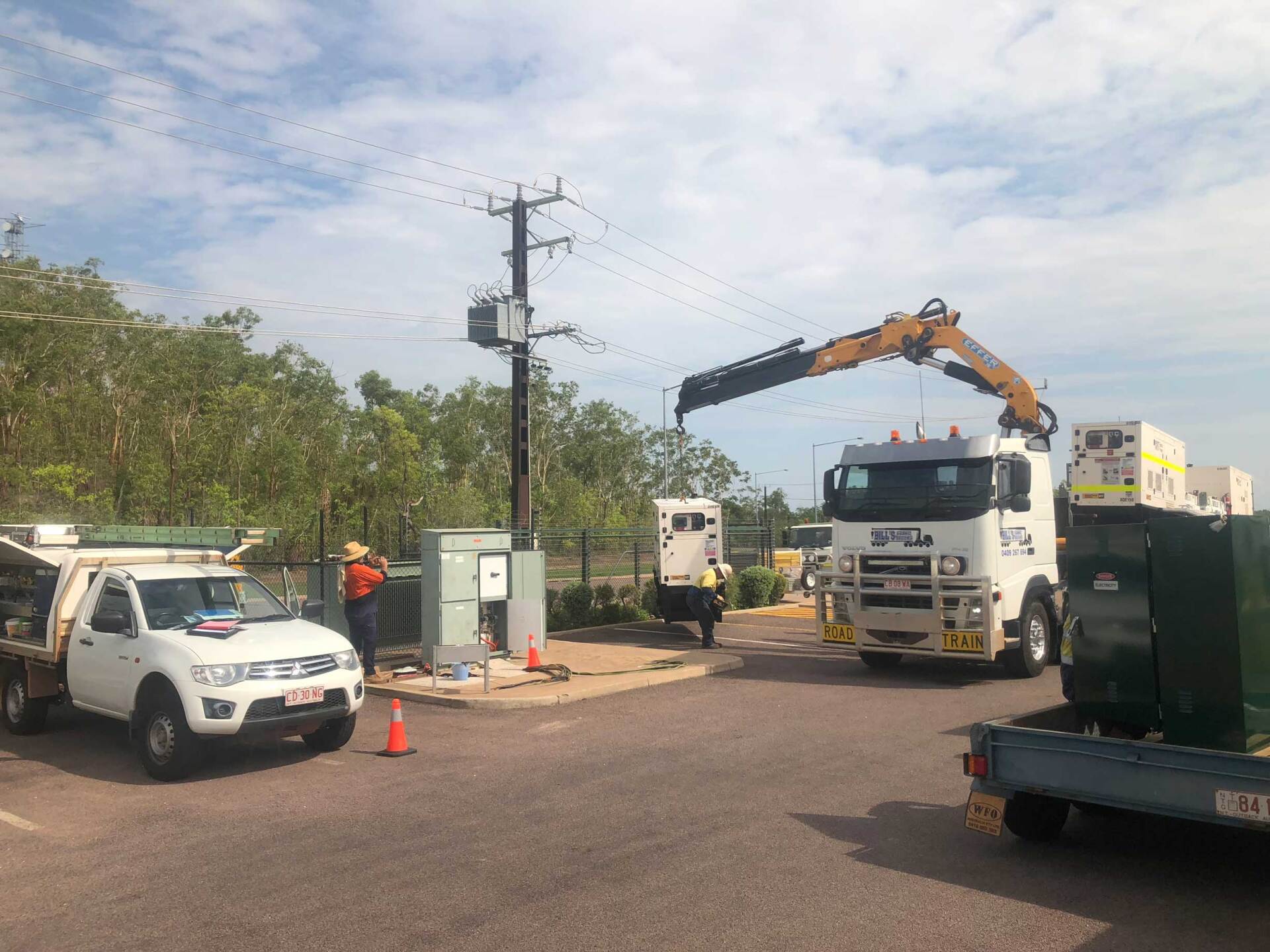 Technicians Using Crane To Lift Equipment — Refrigeration in Berrimah, NT