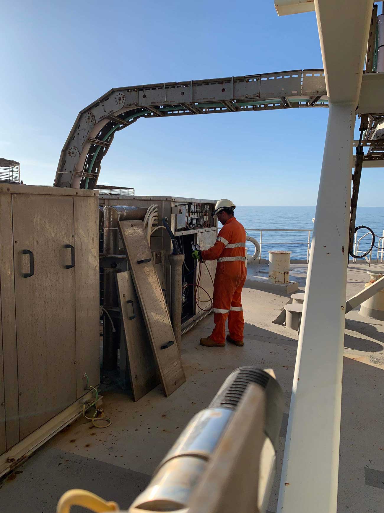 Technician Repairing Equipment On Ship — Refrigeration in Berrimah, NT