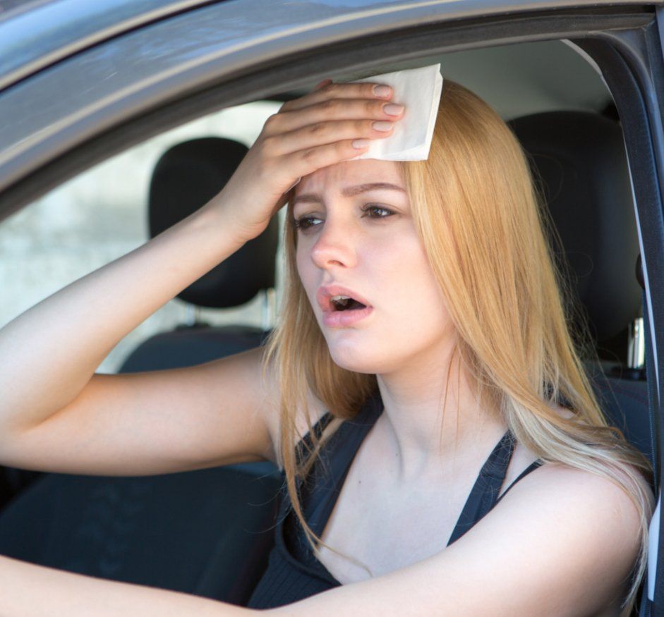 Girl Wiping Her Brow — Auto Electrical in Rockhampton, QLD