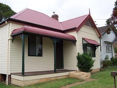 Red Roof House with Vinyl Sidings — Hobart, TAS — Building Improvement Specialists