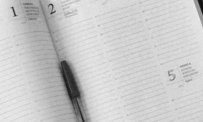 Aerial view of 2 men walking down footpath