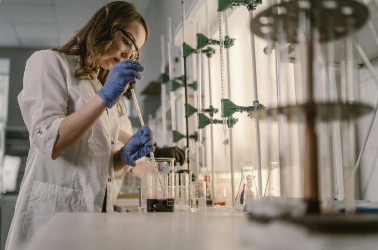 Woman looking in micrscope