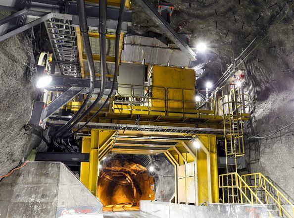 A Large Yellow Machine Is Sitting In The Middle Of A Tunnel — ADR Engineering in Collinsville, QLD