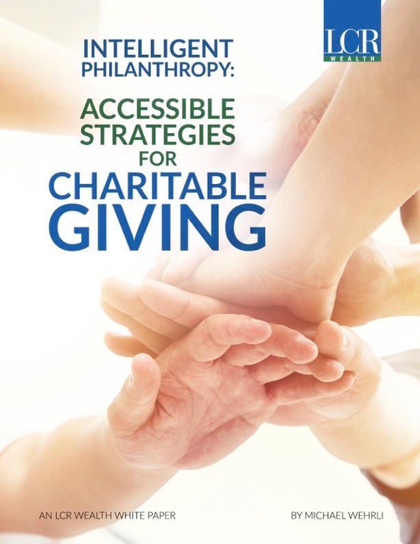 Hands stacked together on a cover titled “Accessible Strategies for Charitable Giving”