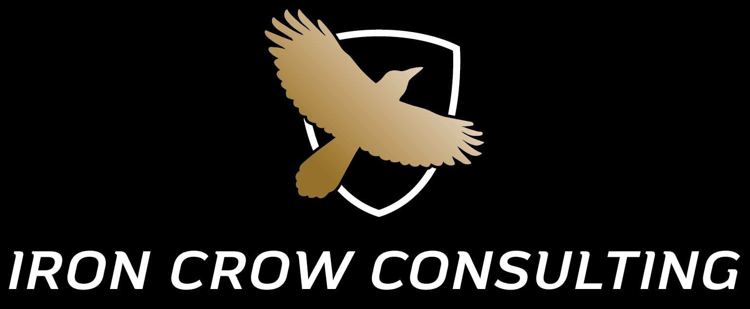 a logo for iron crow consulting with a bird on a shield