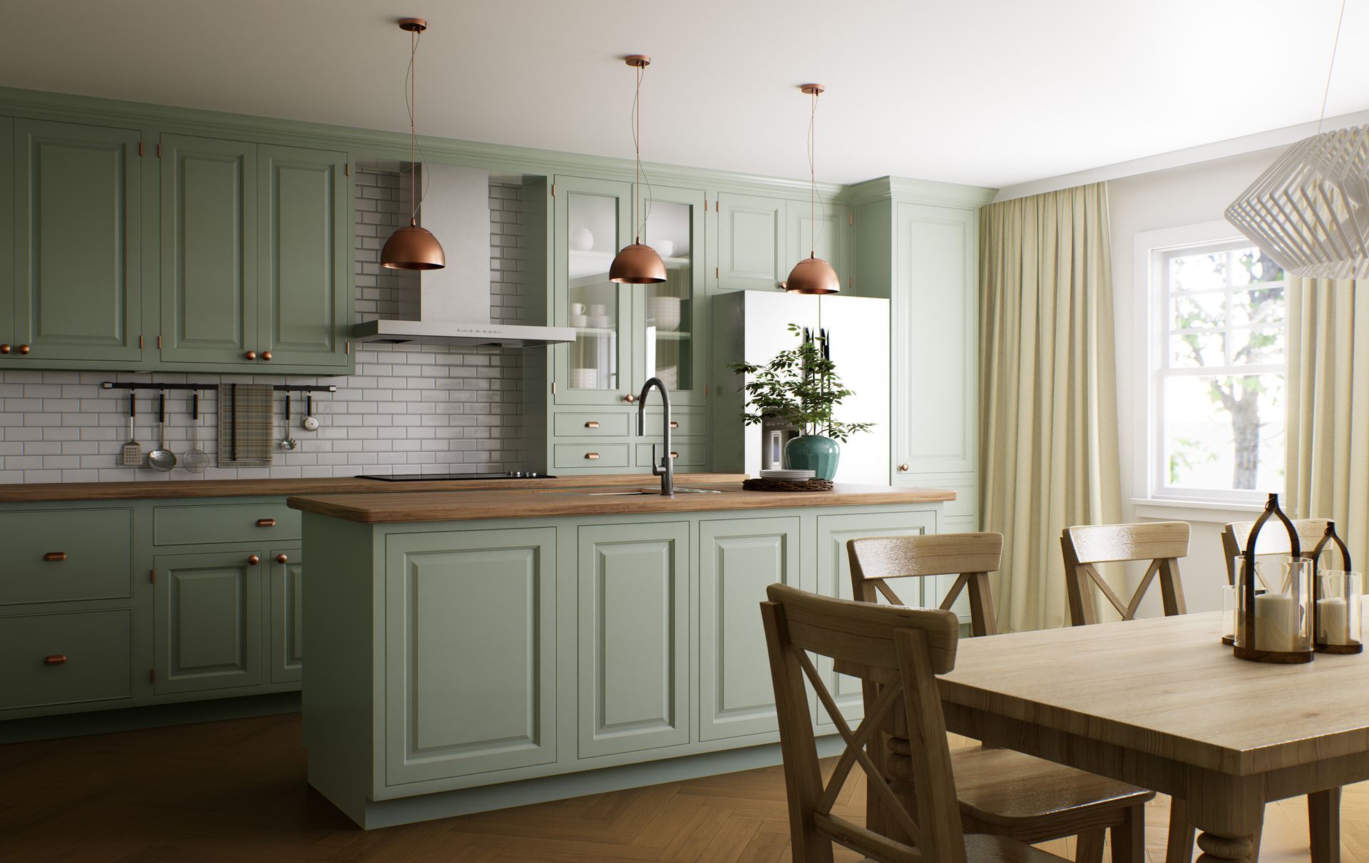 Una cucina con mobili verdi, tavolo e sedie in legno.