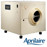 Aprilaire whole-house dehumidifier, beige, with a large circular vent.