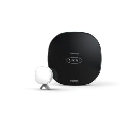 Black and white smart home thermostat system: base unit and white sensor.