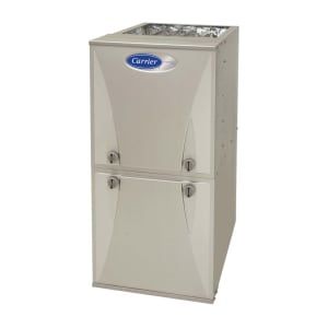Carrier brand gas furnace, silver, upright, two-door unit with blue logo on a plain background.
