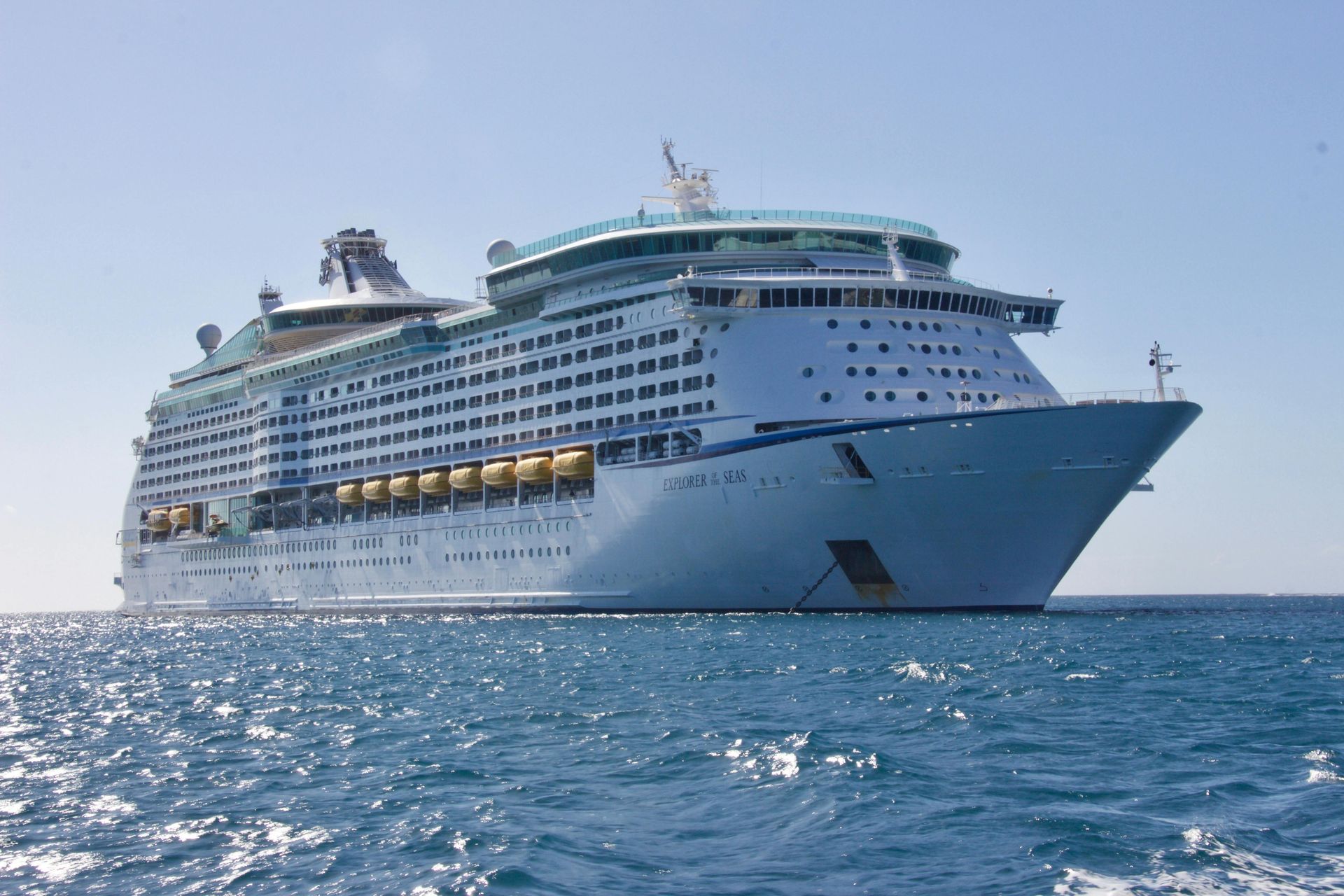A large cruise ship is floating in the sea