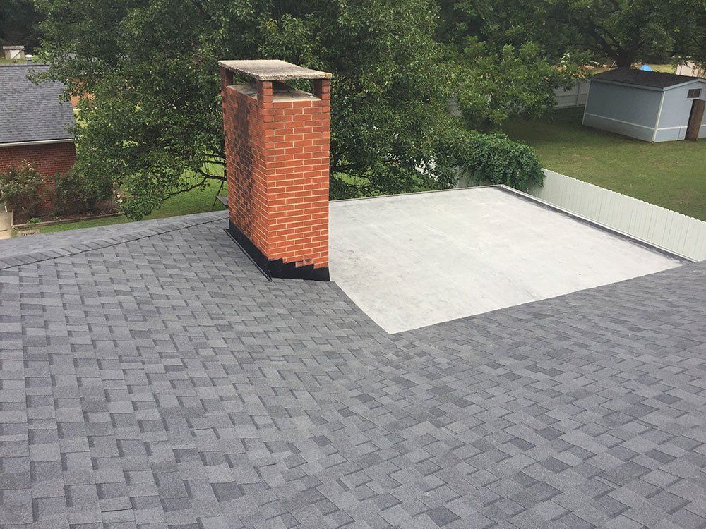 New Roof around chimney from Shield Roofing