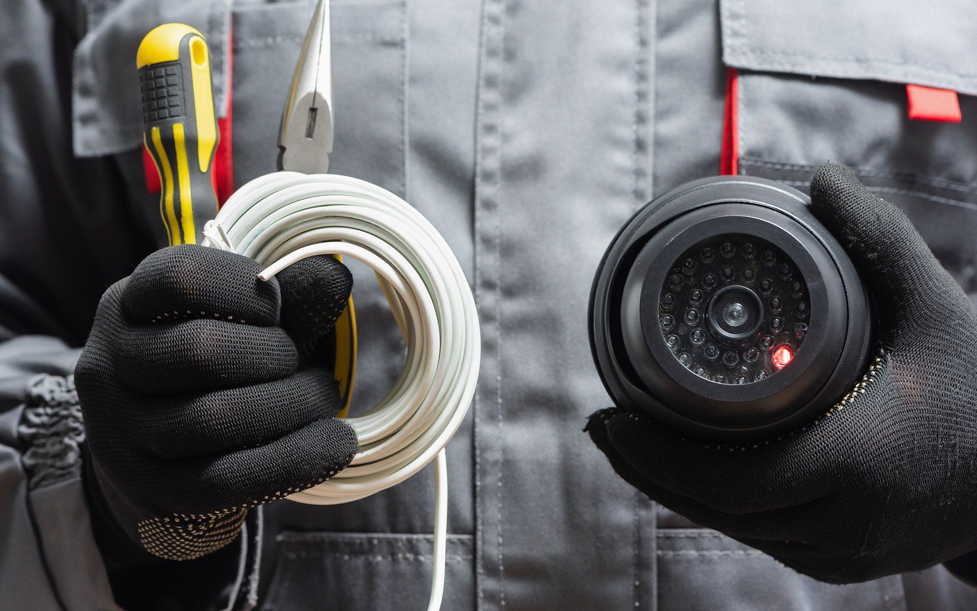A bunch of cables are connected to a server in a data center.